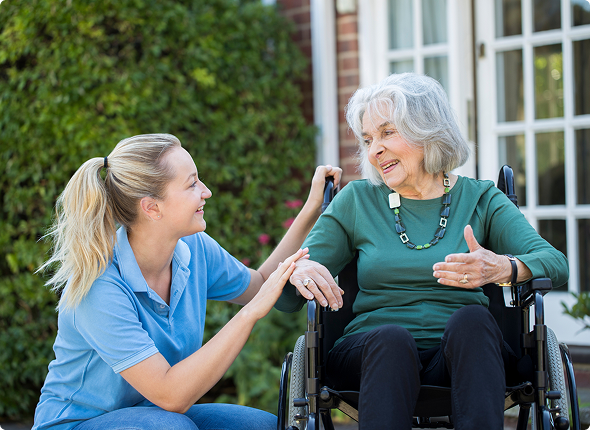 Caregiver Helping Patient